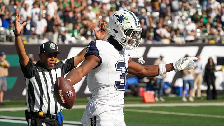 Dallas Cowboys wide receiver George Pickens reacts after catching a touchdown against the New York Jets 