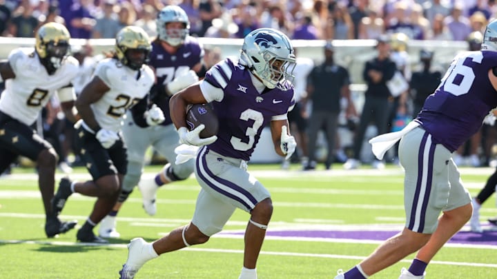 Sep 27, 2025; Manhattan, Kansas, USA; Kansas State Wildcats running back Dylan Edwards (3) carries the ball during the first quarter against the UCF Knights at Bill Snyder Family Football Stadium. Mandatory Credit: Scott Sewell-Imagn Images Sep 27, 2025; Manhattan, Kansas, USA; Kansas State Wildcats running back Dylan Edwards (3) carries the ball during the first quarter against the UCF Knights at Bill Snyder Family Football Stadium. Mandatory Credit: Scott Sewell-Imagn Images