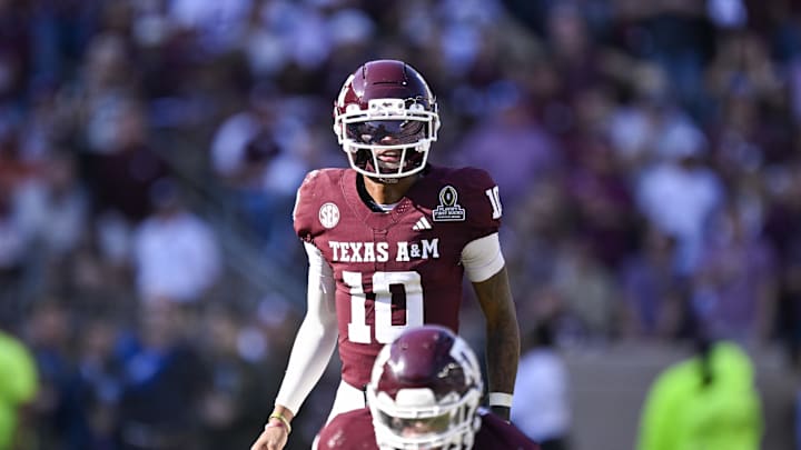 Dec 20, 2025; College Station, TX, USA; Texas A&M Aggies quarterback Marcel Reed (10) looks on during the game between the Aggies and the Hurricanes at Kyle Field. Mandatory Credit: Jerome Miron-Imagn Images