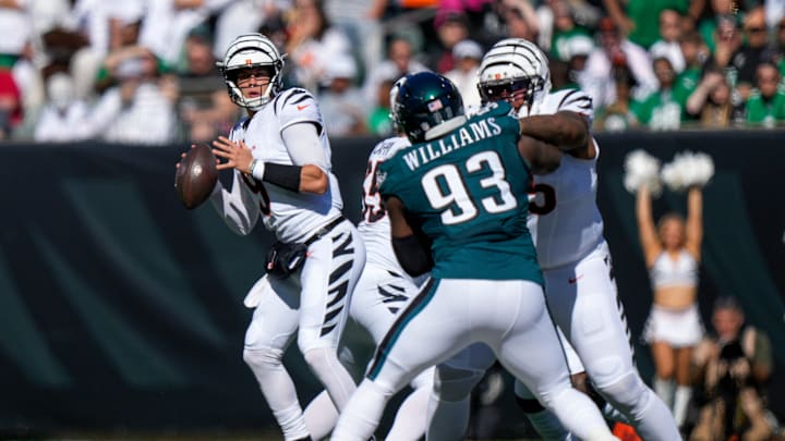 Cincinnati Bengals quarterback Joe Burrow (9) drops back to throw a deep pass in the second quarter of the NFL Week 8 game between the Cincinnati Bengals and the Philadelphia Eagles at Paycor Stadium in downtown Cincinnati on Sunday, Oct. 27, 2024.