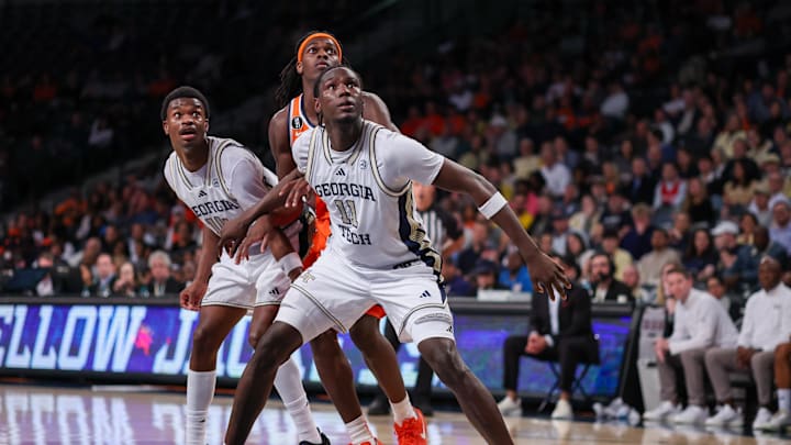 Jan 6, 2026; Atlanta, Georgia, USA; Georgia Tech Yellow Jackets forward Baye Ndongo (11) boxes out against the Syracuse Orange in the first half at McCamish Pavilion. Mandatory Credit: Brett Davis-Imagn Images
Jan 6, 2026; Atlanta, Georgia, USA; Georgia Tech Yellow Jackets forward Baye Ndongo (11) boxes out against the Syracuse Orange in the first half at McCamish Pavilion. Mandatory Credit: Brett Davis-Imagn Images
