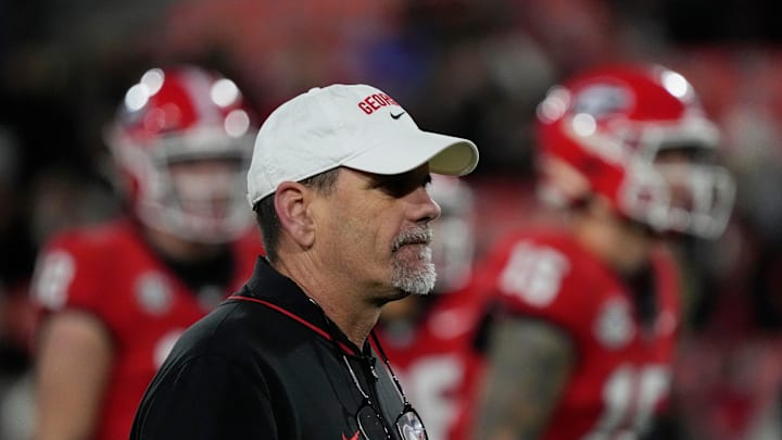 Georgia Offensive Coordinator Mike Bobo looks on during warm ups before the start of a NCAA college football game against Georgia Tech in Athens, Ga., on Friday, Nov. 29, 2024. Georgia Offensive Coordinator Mike Bobo looks on during warm ups before the start of a NCAA college football game against Georgia Tech in Athens, Ga., on Friday, Nov. 29, 2024.