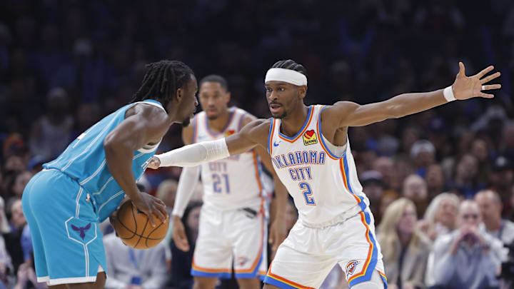 Jan 5, 2026; Oklahoma City, Oklahoma, USA; Oklahoma City Thunder guard Shai Gilgeous-Alexander (2) defends Charlotte Hornets guard Sion James (4) during the second quarter at Paycom Center. Mandatory Credit: Alonzo Adams-Imagn Images Jan 5, 2026; Oklahoma City, Oklahoma, USA; Oklahoma City Thunder guard Shai Gilgeous-Alexander (2) defends Charlotte Hornets guard Sion James (4) during the second quarter at Paycom Center. Mandatory Credit: Alonzo Adams-Imagn Images