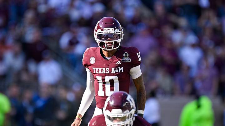 Dec 20, 2025; College Station, TX, USA; Texas A&M Aggies quarterback Marcel Reed (10) looks on during the game between the Aggies and the Hurricanes at Kyle Field. Mandatory Credit: Jerome Miron-Imagn Images