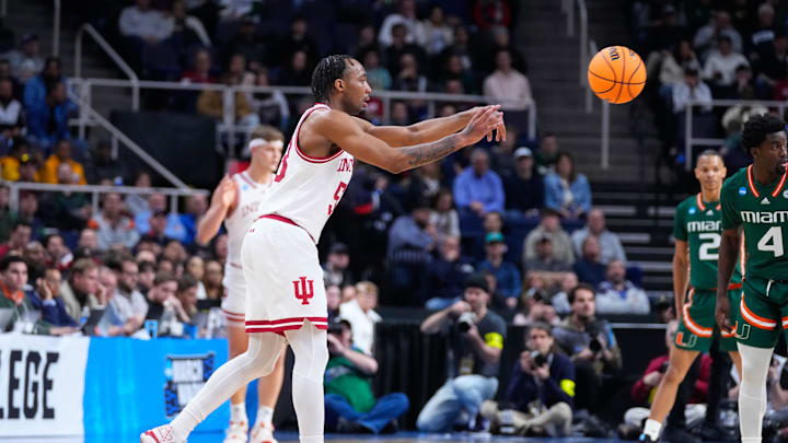 Mar 19, 2023; Albany, NY, USA; Indiana Hoosiers guard Tamar Bates (53) passes the ball against the Miami Hurricanes during the first half at MVP Arena. Mandatory Credit: Gregory Fisher-Imagn Images