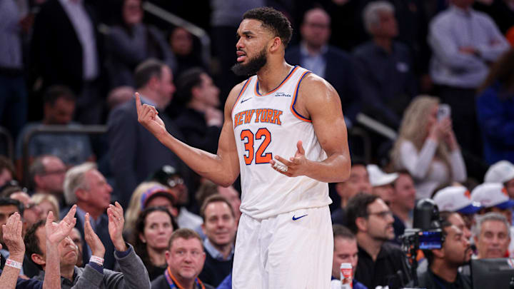 Feb 3, 2025; New York, New York, USA; New York Knicks center Karl-Anthony Towns (32) reacts after fouling out during the second half against the Houston Rockets at Madison Square Garden. Mandatory Credit: Vincent Carchietta-Imagn Images