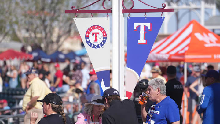 Fans watch as the Arizona Diamondbacks play against the Texas Rangers at Surprise Stadium on Sunday, March 2, 2025.