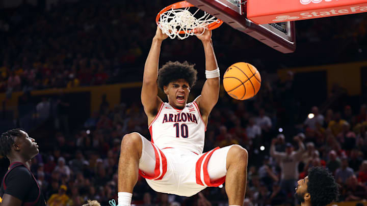 Jan 31, 2026; Tempe, Arizona, USA; Arizona Wildcats forward Koa Peat (10) screams as he slam dunks the ball against the Arizona State Sun Devils in the second half at Desert Financial Arena. Mandatory Credit: Mark J. Rebilas-Imagn Images Jan 31, 2026; Tempe, Arizona, USA; Arizona Wildcats forward Koa Peat (10) screams as he slam dunks the ball against the Arizona State Sun Devils in the second half at Desert Financial Arena. Mandatory Credit: Mark J. Rebilas-Imagn Images