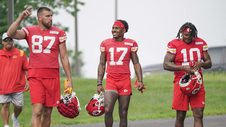 Kansas City Chiefs tight ends Travis Kelce (87) and wide receiver Mecole Hardman (17) and running back Isiah Pacheco (10) walk down to the fields during training camp at Missouri Western State University. Kansas City Chiefs tight ends Travis Kelce (87) and wide receiver Mecole Hardman (17) and running back Isiah Pacheco (10) walk down to the fields during training camp at Missouri Western State University.