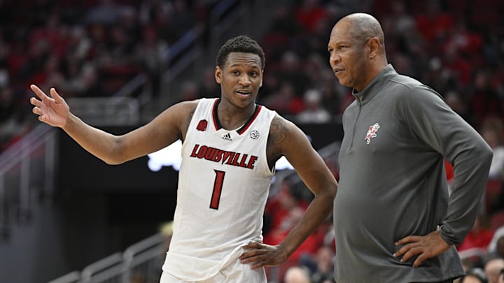 Jan 13, 2024; Louisville, Kentucky, USA;  Louisville Cardinals guard Curtis Williams (1) talks with