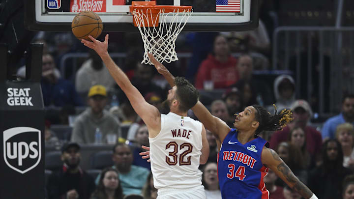 Oct 14, 2025; Cleveland, Ohio, USA; Cleveland Cavaliers forward Dean Wade (32) shoots beside Detroit Pistons forward Bobi Klintman (34) in the second quarter at Rocket Arena. Mandatory Credit: David Richard-Imagn Images Oct 14, 2025; Cleveland, Ohio, USA; Cleveland Cavaliers forward Dean Wade (32) shoots beside Detroit Pistons forward Bobi Klintman (34) in the second quarter at Rocket Arena. Mandatory Credit: David Richard-Imagn Images