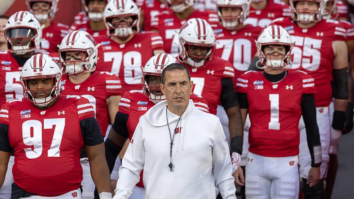 Oct 24, 2026; Madison, Wisconsin, USA;  Wisconsin Badgers head coach Luke Fickell walks onto the field with his team for warmups before the game against the USC Trojans at Camp Randall Stadium.  Mandatory Credit: Anthony Wahl-Imagn Images