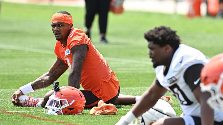 Jul 29, 2026; Berea, OH, USA; Cleveland Browns quarterback Deshaun Watson (4) stretches during training camp at CrossCountry Mortgage Campus. Mandatory Credit: Ken Blaze-Imagn Images Jul 29, 2026; Berea, OH, USA; Cleveland Browns quarterback Deshaun Watson (4) stretches during training camp at CrossCountry Mortgage Campus. Mandatory Credit: Ken Blaze-Imagn Images