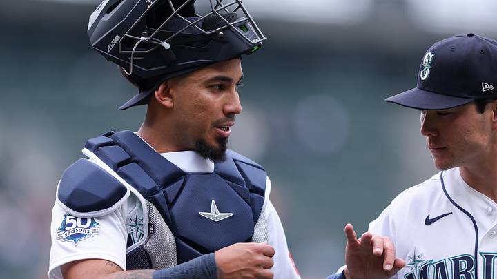 May 6, 2026; Seattle, Washington, USA; Seattle Mariners catcher Jhonny Pereda (5) high fives starting pitcher Bryan Woo (22) after the fifth inning against the Atlanta Braves at T-Mobile Park. Mandatory Credit: Kevin Ng-Imagn Images