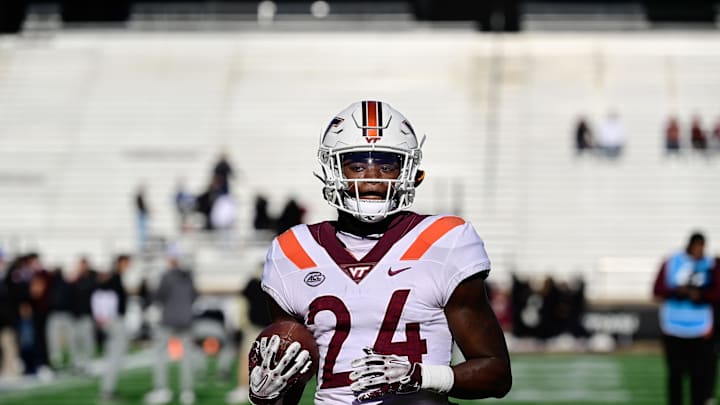 Nov 11, 2023; Chestnut Hill, Massachusetts, USA; Virginia Tech Hokies running back Malachi Thomas (24) warms up before a game against the Boston College Eagles at Alumni Stadium. Mandatory Credit: Eric Canha-Imagn Images Nov 11, 2023; Chestnut Hill, Massachusetts, USA; Virginia Tech Hokies running back Malachi Thomas (24) warms up before a game against the Boston College Eagles at Alumni Stadium. Mandatory Credit: Eric Canha-Imagn Images