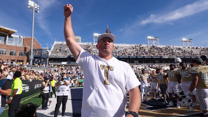 Oct 25, 2025; Atlanta, Georgia, USA; Georgia Tech Yellow Jackets head coach Brent Key celebrates after a victory over the Syracuse Orange at Bobby Dodd Stadium at Hyundai Field. Mandatory Credit: Brett Davis-Imagn Images