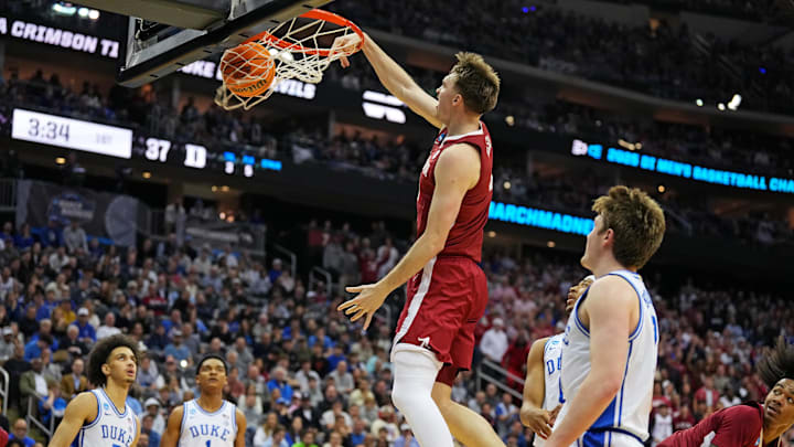 Mar 29, 2025; Newark, NJ, USA; Alabama Crimson Tide forward Grant Nelson (4) dunks the ball against Duke Blue Devils guard Kon Knueppel (7) during the first half in the East Regional final of the 2025 NCAA tournament at Prudential Center. Mandatory Credit: Robert Deutsch-Imagn Images Mar 29, 2025; Newark, NJ, USA; Alabama Crimson Tide forward Grant Nelson (4) dunks the ball against Duke Blue Devils guard Kon Knueppel (7) during the first half in the East Regional final of the 2025 NCAA tournament at Prudential Center. Mandatory Credit: Robert Deutsch-Imagn Images