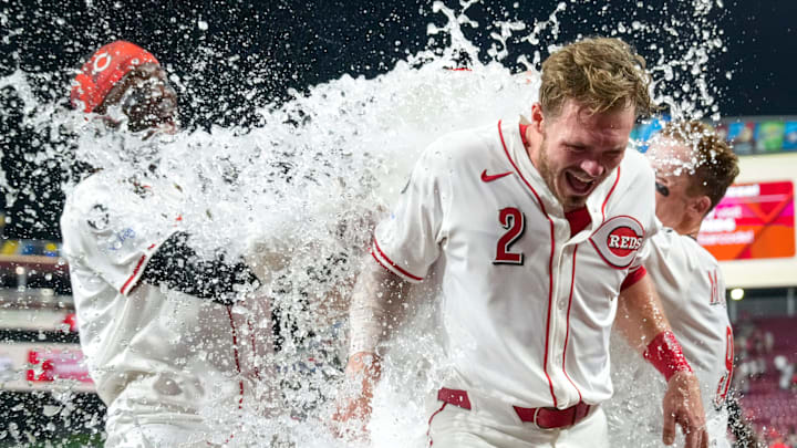 Cincinnati Reds pinch hitter Gavin Lux (2) receives an ice bath from Elly De La Cruz and Matt McLain after hitting a walk-off line drive for a Reds win in the bottom of the 11th inning of the MLB interleague game between the Cincinnati Reds and the New York Yankees at Great American Ball Park in downtown Cincinnati on Tuesday, June 24, 2025. The Reds won 5-4 in 11 innings. Cincinnati Reds pinch hitter Gavin Lux (2) receives an ice bath from Elly De La Cruz and Matt McLain after hitting a walk-off line drive for a Reds win in the bottom of the 11th inning of the MLB interleague game between the Cincinnati Reds and the New York Yankees at Great American Ball Park in downtown Cincinnati on Tuesday, June 24, 2025. The Reds won 5-4 in 11 innings.