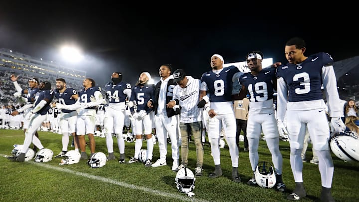 Penn State Nittany Lions players sing their alma mater following a win over the Washington Huskies at Beaver Stadium.