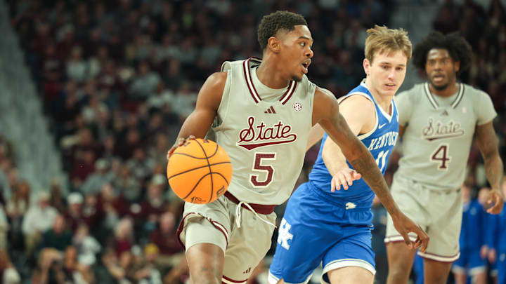 Jan 11, 2025; Starkville, Mississippi, USA; Mississippi State Bulldogs guard Shawn Jones Jr. (5) drives to the basket against the Kentucky Wildcats during the second half at Humphrey Coliseum. Mandatory Credit: Wesley Hale-Imagn Images Jan 11, 2025; Starkville, Mississippi, USA; Mississippi State Bulldogs guard Shawn Jones Jr. (5) drives to the basket against the Kentucky Wildcats during the second half at Humphrey Coliseum. Mandatory Credit: Wesley Hale-Imagn Images
