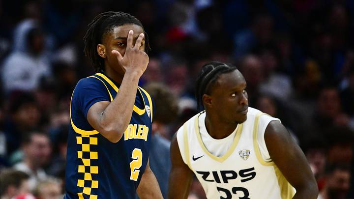 Mar 14, 2026; Cleveland, OH, USA; Toledo Rockets guard Leroy Blyden Jr. (2) celebrates after hitting a three point basket against the Akron Zips during the first half of the men’s Mid-American Conference Championship at Rocket Arena. Mandatory Credit: Ken Blaze-Imagn Images