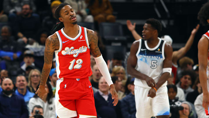 Jan 20, 2025; Memphis, Tennessee, USA; Memphis Grizzlies guard Ja Morant (12) reacts during the second quarter against the Minnesota Timberwolves at FedExForum. Mandatory Credit: Petre Thomas-Imagn Images