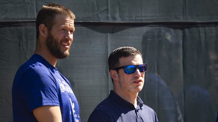 Mar 14, 2022; Glendale, AZ, USA; Los Angeles Dodgers pitcher Clayton Kershaw (left) with Dodgers president of baseball operations Andrew Friedman during spring training workouts at Camelback Ranch. Mandatory Credit: Mark J. Rebilas-Imagn Images Mar 14, 2022; Glendale, AZ, USA; Los Angeles Dodgers pitcher Clayton Kershaw (left) with Dodgers president of baseball operations Andrew Friedman during spring training workouts at Camelback Ranch. Mandatory Credit: Mark J. Rebilas-Imagn Images