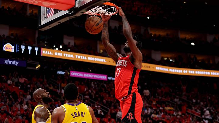 May 1, 2026; Houston, Texas, USA; Houston Rockets forward Tari Eason (17) dunks against the Los Angeles Lakers during the first quarter game six of the first round of the 2026 NBA Playoffs at Toyota Center. Mandatory Credit: Erik Williams-Imagn Images