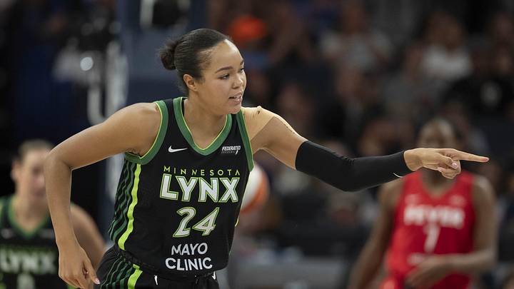 Aug 24, 2025; Minneapolis, Minnesota, USA; Minnesota Lynx forward Napheesa Collier (24) points to the bench after making a three point shot against the Indiana Fever in the second half at Target Center. Mandatory Credit: Jesse Johnson-Imagn Images