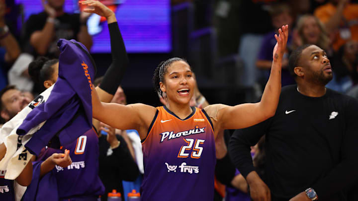 Aug 7, 2025; Phoenix, Arizona, USA; Phoenix Mercury forward Alyssa Thomas (25) celebrates after becoming the first player in WNBA history to record three triple doubles in a row against the Indiana Fever at PHX Arena. Mandatory Credit: Mark J. Rebilas-Imagn Images
