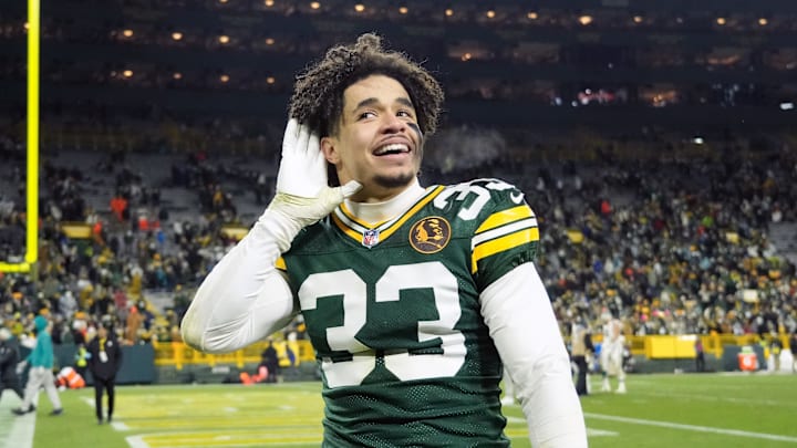 Nov 28, 2024; Green Bay, Wisconsin, USA; Green Bay Packers safety Evan Williams (33) celebrates following the game against the Miami Dolphins at Lambeau Field. Mandatory Credit: Jeff Hanisch-Imagn Images Nov 28, 2024; Green Bay, Wisconsin, USA; Green Bay Packers safety Evan Williams (33) celebrates following the game against the Miami Dolphins at Lambeau Field. Mandatory Credit: Jeff Hanisch-Imagn Images