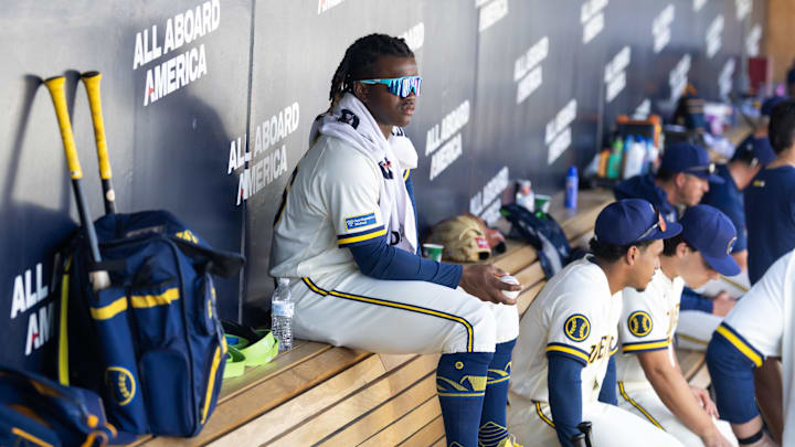 Feb 27, 2026; Phoenix, Arizona, USA; Milwaukee Brewers infielder Jesus Made sits in the dugout against the Chicago White Sox during a spring training game at American Family Fields of Phoenix. Mandatory Credit: Mark J. Rebilas-Imagn Images
