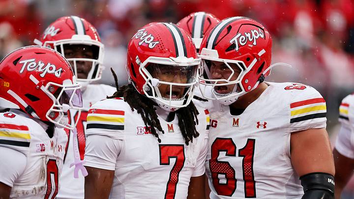 Oct 10, 2026; Columbus, Ohio, USA;  Maryland Terrapins quarterback Malik Washington (7) celebrates his touchdown run with Maryland Terrapins offensive lineman Michael Hershey (61) during the second quarter against the Ohio State Buckeyes at Ohio Stadium.  Mandatory Credit: Joseph Maiorana-Imagn Images