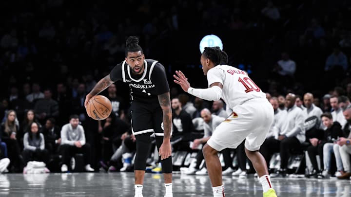 Feb 20, 2025; Brooklyn, New York, USA; Brooklyn Nets guard D'Angelo Russell (1) sets the play while being defended by Cleveland Cavaliers guard Darius Garland (10) during the first half at Barclays Center. Mandatory Credit: John Jones-Imagn Images Feb 20, 2025; Brooklyn, New York, USA; Brooklyn Nets guard D'Angelo Russell (1) sets the play while being defended by Cleveland Cavaliers guard Darius Garland (10) during the first half at Barclays Center. Mandatory Credit: John Jones-Imagn Images