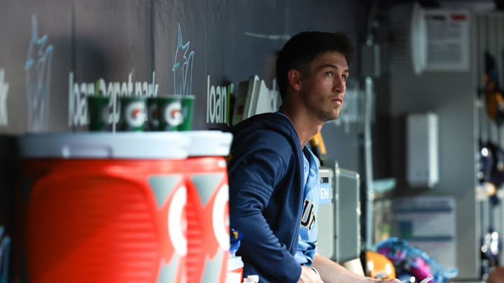 Apr 17, 2026; Miami, Florida, USA; Milwaukee Brewers starting pitcher Coleman Crow (57) looks on from inside the dugout against the Miami Marlins during the second inning at loanDepot Park. Mandatory Credit: Sam Navarro-Imagn Images