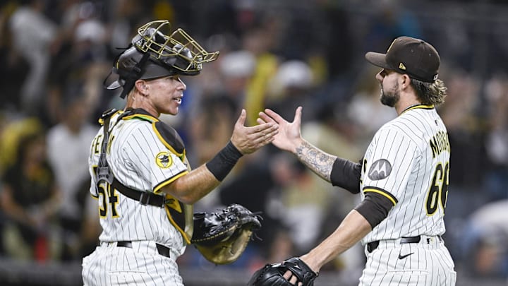 Aug 20, 2025; San Diego, California, USA; San Diego Padres relief pitcher David Morgan (66) and Freddy Fermin (54) celebrate after the Padres beat the San Francisco Giants at Petco Park. Mandatory Credit: Denis Poroy-Imagn Images Aug 20, 2025; San Diego, California, USA; San Diego Padres relief pitcher David Morgan (66) and Freddy Fermin (54) celebrate after the Padres beat the San Francisco Giants at Petco Park. Mandatory Credit: Denis Poroy-Imagn Images