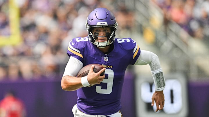 Aug 9, 2025; Minneapolis, Minnesota, USA; Minnesota Vikings quarterback J.J. McCarthy (9) scrambles for a gain against the Houston Texans during the first quarter at U.S. Bank Stadium. Mandatory Credit: Jeffrey Becker-Imagn Images