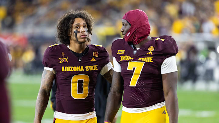 Nov 28, 2025; Tempe, Arizona, USA; Arizona State Sun Devils wide receiver Jordyn Tyson (0) with tight end Chamon Metayer (7) against the Arizona Wildcats during the 99th Territorial Cup at Mountain America Stadium. Mandatory Credit: Mark J. Rebilas-Imagn Images