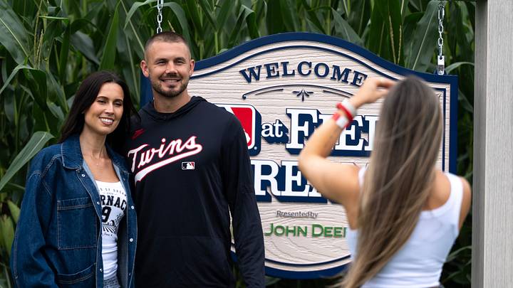 Minnesota Twins outfielder Trevor Larnach takes a photo by the Field of Dreams sign Aug. 13, 2026 in Dyersville, Iowa. Minnesota Twins outfielder Trevor Larnach takes a photo by the Field of Dreams sign Aug. 13, 2026 in Dyersville, Iowa.