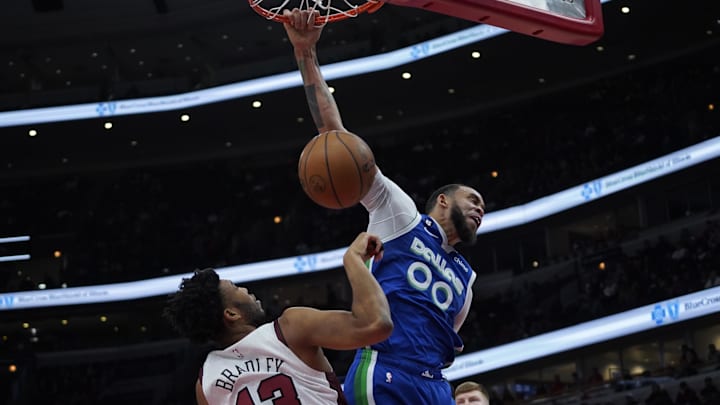 Dec 10, 2022; Chicago, Illinois, USA; Dallas Mavericks center JaVale McGee (00) dunks the ball against Chicago Bulls center Tony Bradley (13) during the second half at United Center. Mandatory Credit: David Banks-Imagn Images Dec 10, 2022; Chicago, Illinois, USA; Dallas Mavericks center JaVale McGee (00) dunks the ball against Chicago Bulls center Tony Bradley (13) during the second half at United Center. Mandatory Credit: David Banks-Imagn Images