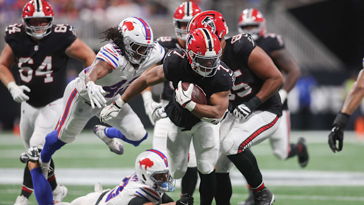 Oct 13, 2025; Atlanta, GA;  Atlanta Falcons running back Bijan Robinson carries the ball against the Buffalo Bills
