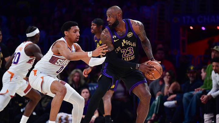 Apr 10, 2026; Los Angeles, California, USA; Phoenix Suns forward Ryan Dunn (0) defends Los Angeles Lakers forward LeBron James (23) during the first half at Crypto.com Arena. Mandatory Credit: Gary A. Vasquez-Imagn Images Apr 10, 2026; Los Angeles, California, USA; Phoenix Suns forward Ryan Dunn (0) defends Los Angeles Lakers forward LeBron James (23) during the first half at Crypto.com Arena. Mandatory Credit: Gary A. Vasquez-Imagn Images