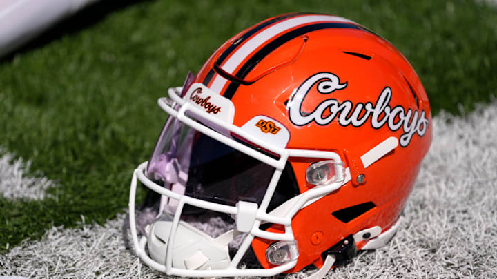 An Oklahoma State helmet is pictured before a college football game between the Oklahoma State Cowboys (OSU) and the West Virginia Mountaineers at Boone Pickens Stadium in Stillwater, Okla., Saturday, Oct. 5, 2024.
