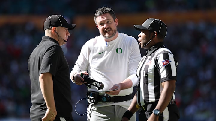 Jan 1, 2026; Miami Gardens, FL, USA; Oregon Ducks head coach Dan Lanning questions the officials during the first half of the 2025 Orange Bowl and quarterfinal game of the College Football Playoff against the Texas Tech Red Raiders at Hard Rock Stadium. 