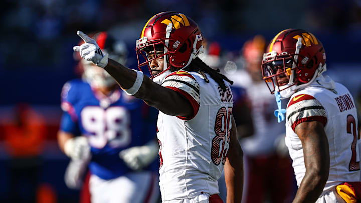 Nov 3, 2024; East Rutherford, New Jersey, USA; Washington Commanders wide receiver Noah Brown (85) reacts after a first down reception during the first half against the New York Giants at MetLife Stadium.  