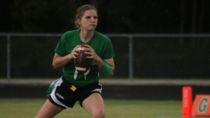 Choctawhatchee quarterback Rowan Franklin (14) looks downfield in the rain against Miami Edison during a Florida High School Athletic Association Class 1A flag football semifinal at Mandarin High School in Jacksonville on May 13, 2022. [Clayton Freeman/Florida Times-Union]