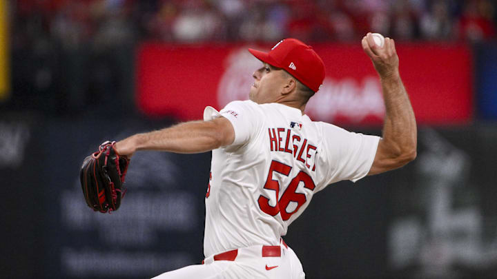 Mar 27, 2025; St. Louis, Missouri, USA;  St. Louis Cardinals relief pitcher Ryan Helsley (56) pitches against the Minnesota Twins during the ninth inning at Busch Stadium. Mandatory Credit: Jeff Curry-Imagn Images