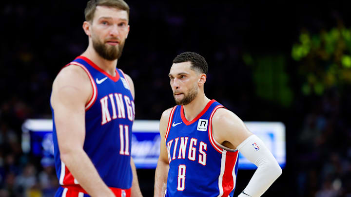 Feb 21, 2025; Sacramento, California, USA; Sacramento Kings guard Zach LaVine (8) and forward Domantas Sabonis (11) look on during the fourth quarter against the Golden State Warriors at Golden 1 Center. Mandatory Credit: Sergio Estrada-Imagn Images