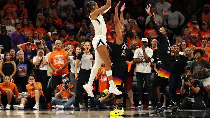 Oct 8, 2025; Phoenix, Arizona, USA; Las Vegas Aces center A'ja Wilson (22) makes a makes the game winning shot against Phoenix Mercury forward Alyssa Thomas (25) in the second half during game three of the 2025 WNBA Finals at PHX Arena. Mandatory Credit: Mark J. Rebilas-Imagn Images