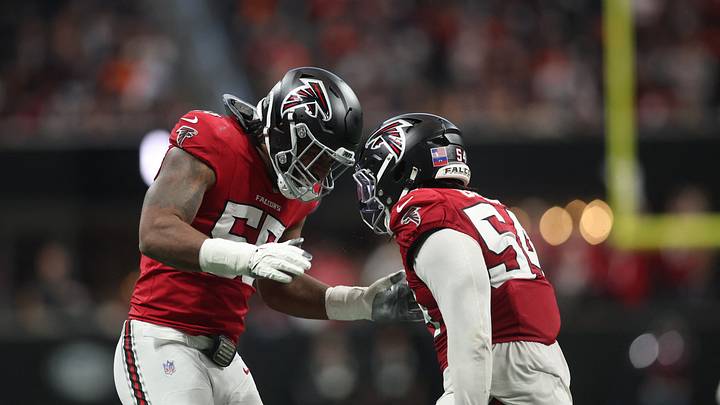 Atlanta Falcons defensive end Za'Darius Smith (55) and defensive line Brandon Dorlus (54)
